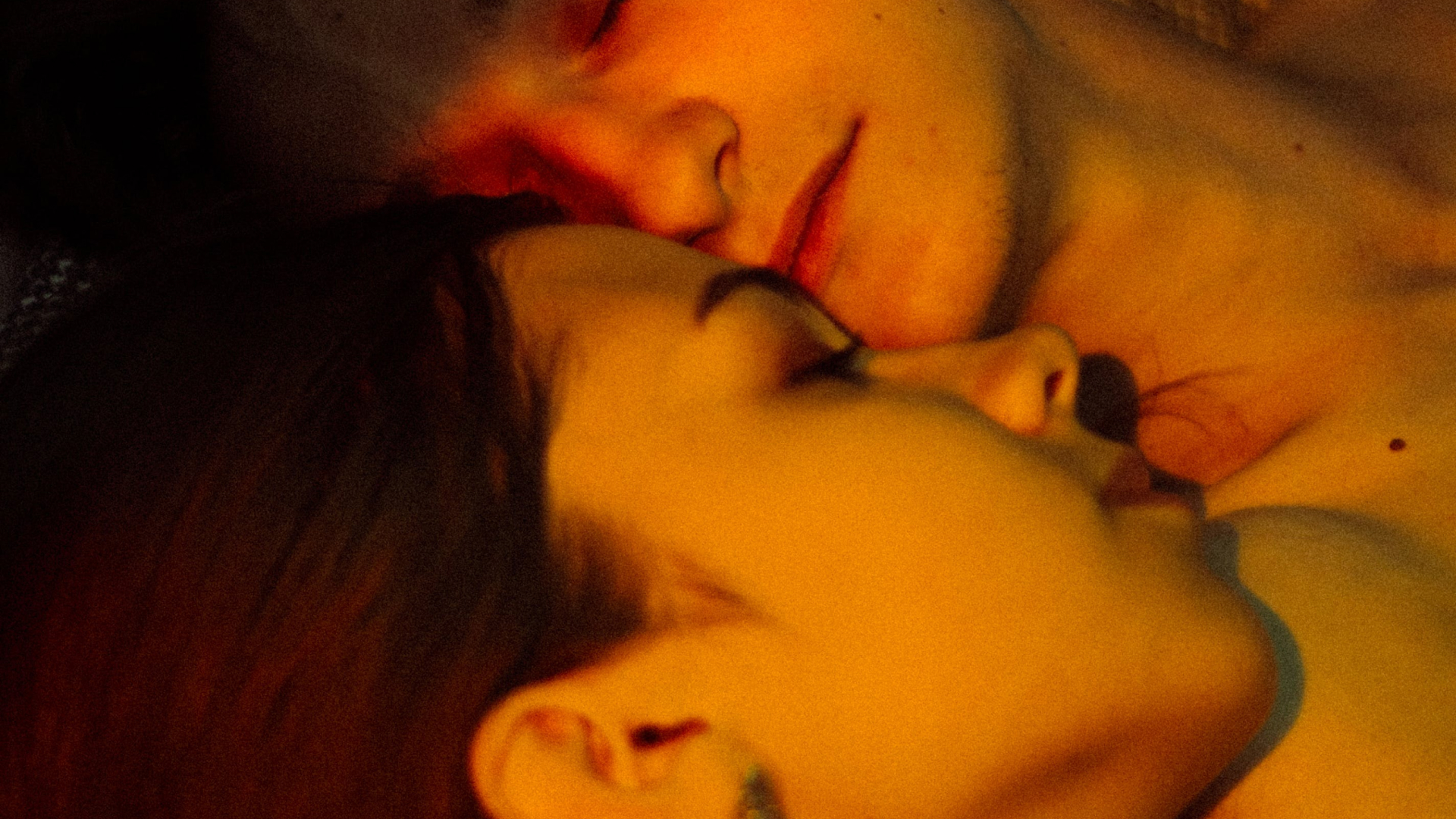 Two women lying together